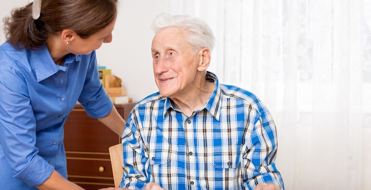 Care Home Manager jobs: frequently asked questions An elderly gentleman talks with a member of the care team