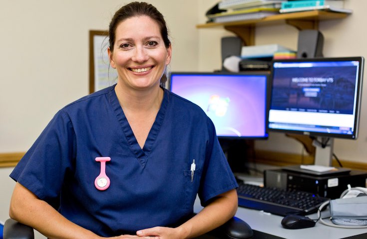 Registered General Nurse jobs: frequently asked questions A nurse sits in front of her computer